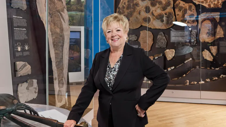 Woman standing in museum gallery