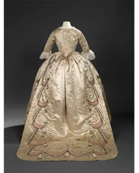 Overdress of a robe en fourreau. Attributed to Marie-Jean "Rose" Bertin (French couturière, 1747-1813). France. 1780's, altered in 1870's. Embroidered satin with ribbon appliqués, sequins, faceted glass stones mounted on silver facings, and silver filé; fitted, boned bodice. 925.18.3.A.
