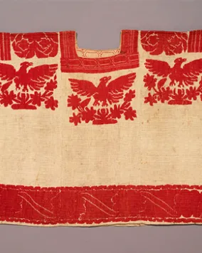 Woman's huipil (bodice). Probably Mazatec culture. State of Oaxaca, Mexico. 1875-1899. Cotton tabby and gauze with cotton satin-stitch embroidery. 943.35.1 Gift of Mrs. Percy Robertson.