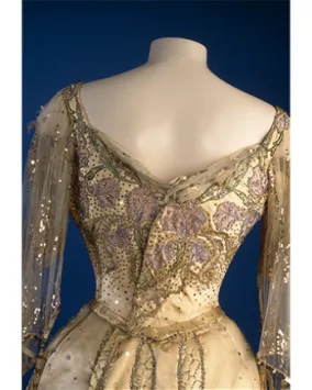 Queen Alexandra's state dress. Morin-Blossier. France. c. 1903. Silk satin with applied design, inserts of chiffon, sequins, diamanté and beads. 942.12.3.A-B Gift of Lieutenant-Colonel James W. Flanagan.