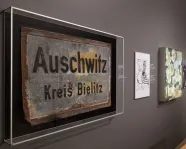 Photo of Auschwitz frame in exhibition reading Auschwitz Kreis Bielitz