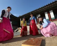 Group playing common New Year’s folk game.
