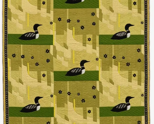 A quilt featuring a duck design set against a vibrant green background, showcasing intricate stitching and colorful patterns.