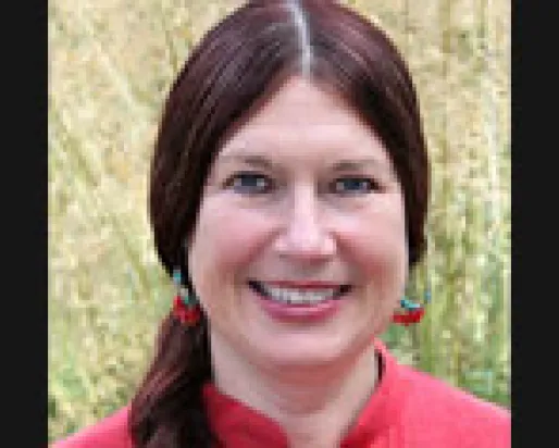 Headshot of Chloë Sayer