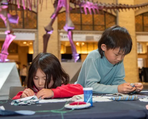Children doing an activity at ROM during March Break