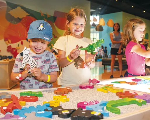3 children enjoying an activity at ROM Kids PA Day Camp