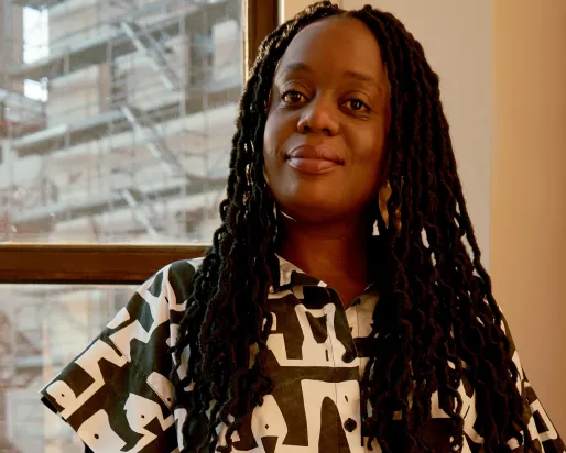 Tandazani Dhlakama standing by a window