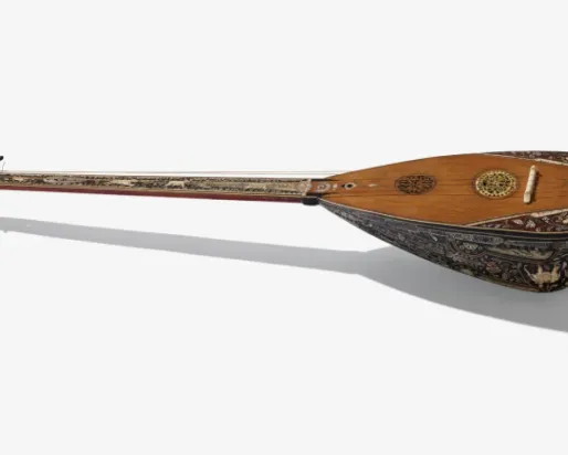 Guitar on it's back with a shadow