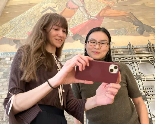 Rox and Kes at the Currely mural at the Royal Ontario Museum