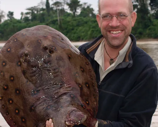 Nathan Lujan holding a stingray