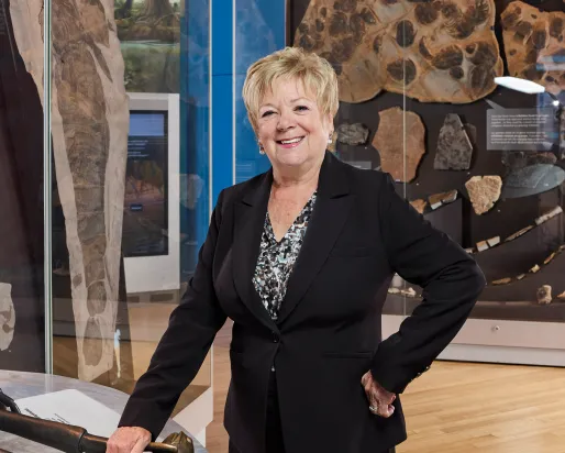 Woman standing in museum gallery