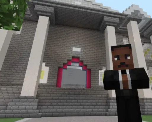 A Minecraft screenshot of a game character with dark skin and a suit standing in front of a large building with classical columns.