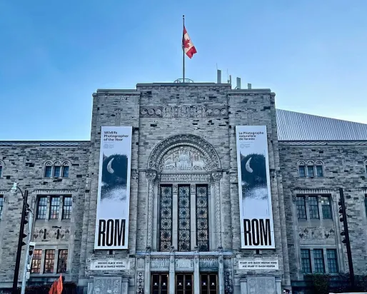 View of the Museum Queen's Park exterior with the Canadian Flag at the top of the building.