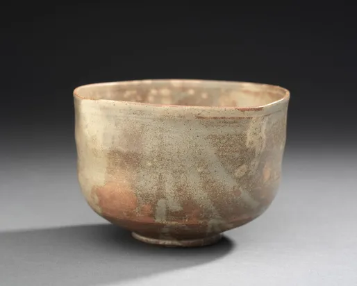 Rounded square tea bowl with flowing glaze