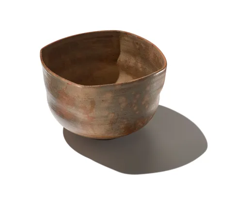 Rounded square tea bowl with flowing glaze, Edo period, late 17th century, stoneware, 8.1 × 13.2 cm