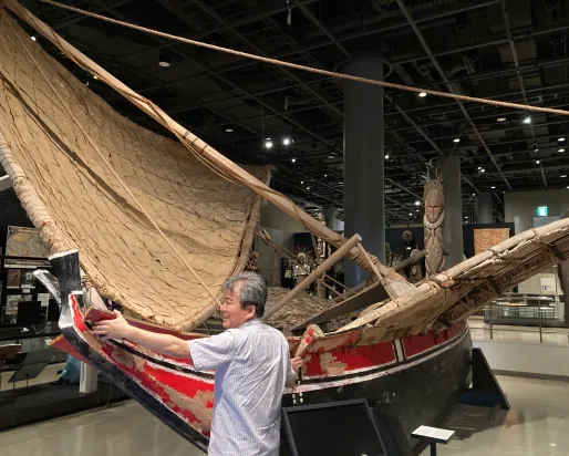 Many touching a canoe