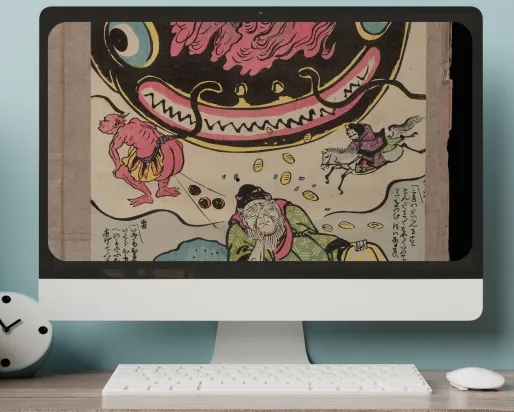 A desktop monitor displays a print of a giant koi