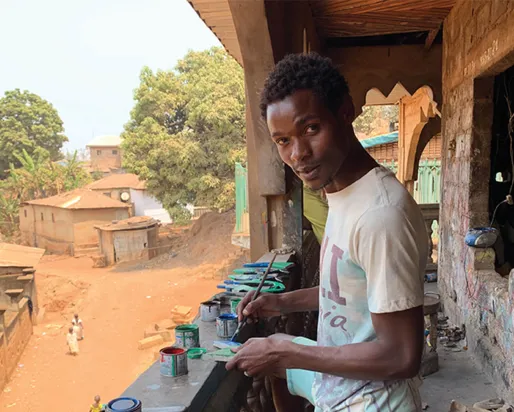 Apprentice working in Amadou Feou’s workshop. Njinka Quarter. Foumban. February 2020.