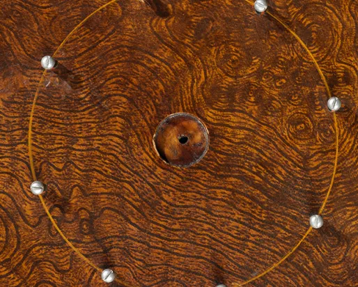 Détail de la planche de crokinole

