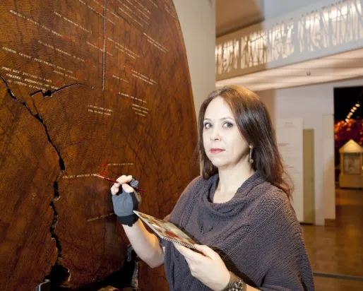 Heidi Sobol conducting conservation work with Tree Cookie
