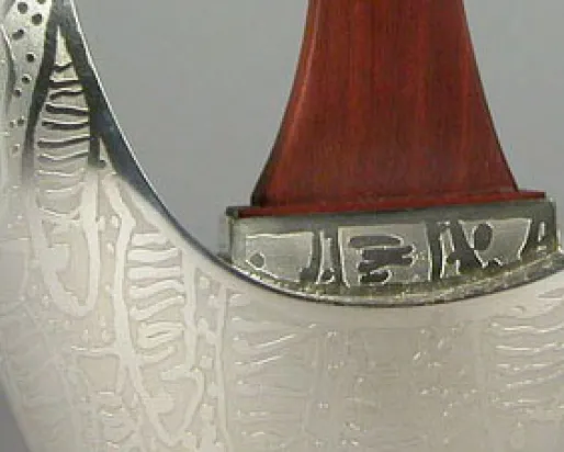 detail of silver teapot
