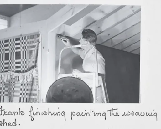 "Frank finishing painting the weaving shed."

