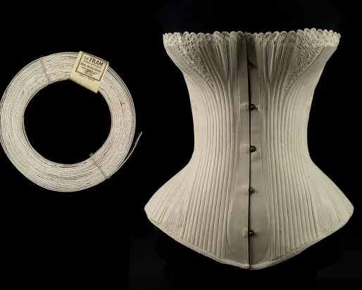Baleen roll and corset on a black background.