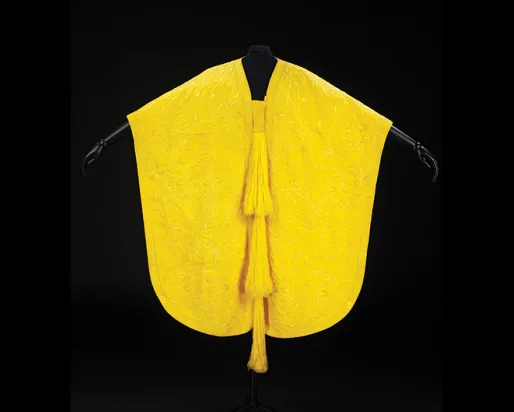 Yellow cape made from golden orb spider silk