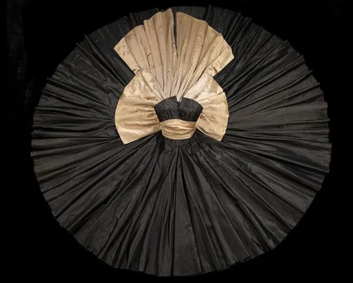 Dior dress on black background
