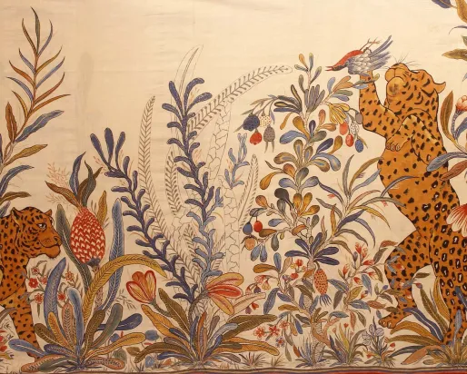 Handspun and handwoven sari with tigers and plants.