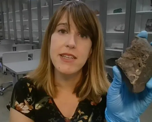 Veronica DiCecco holding asteroid.
