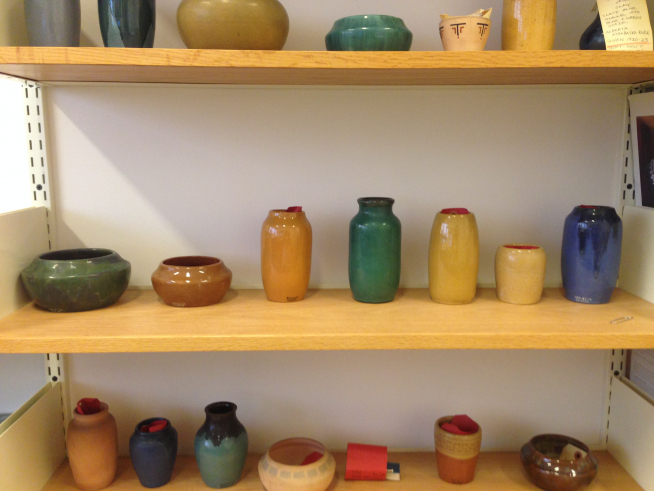 Detail of ceramic vessels on shelf