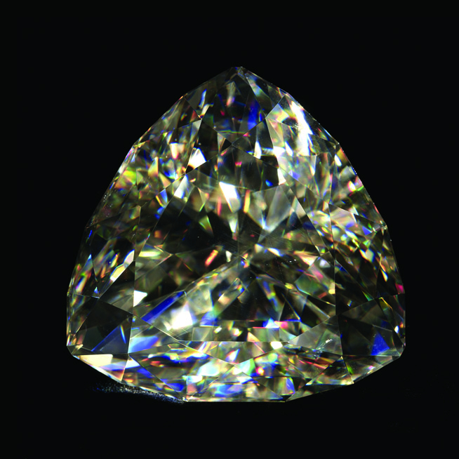 A diamond like gemstone on a black background