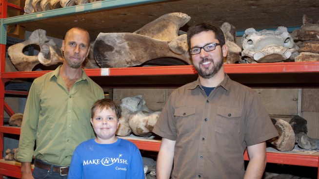 Damien in the collection room with Dr. Hans Larsson and Dr. David Evans.