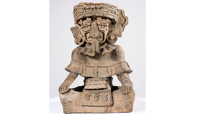 An urn (HM 1953) from a collection of Zapotec artifacts; analysis suggests that this urn is a composite with ancient pieces integrated into a new object that was fabricated in the early twentieth century.