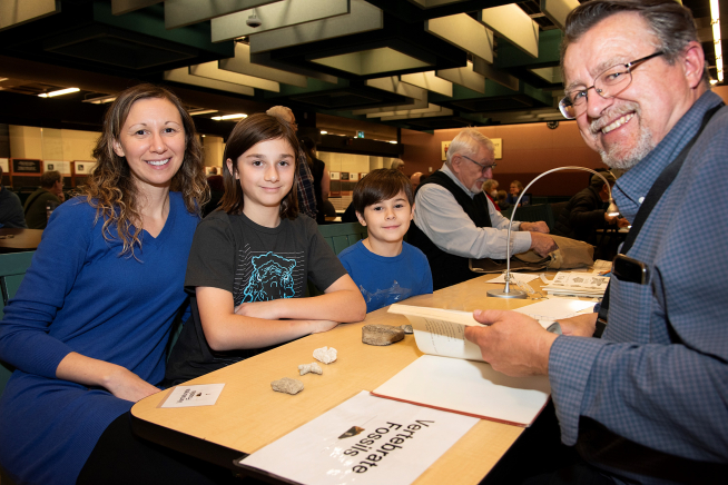 VIsitors bring found objects for identification at ROM.