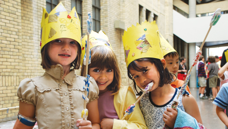 Children in crowns enjoying ROM activity