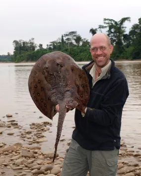 Nathan Lujan with a freshwater ray