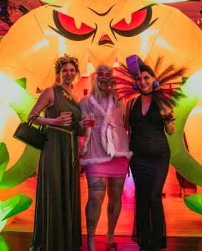 image of 3 women in front of inflatable at RAD 