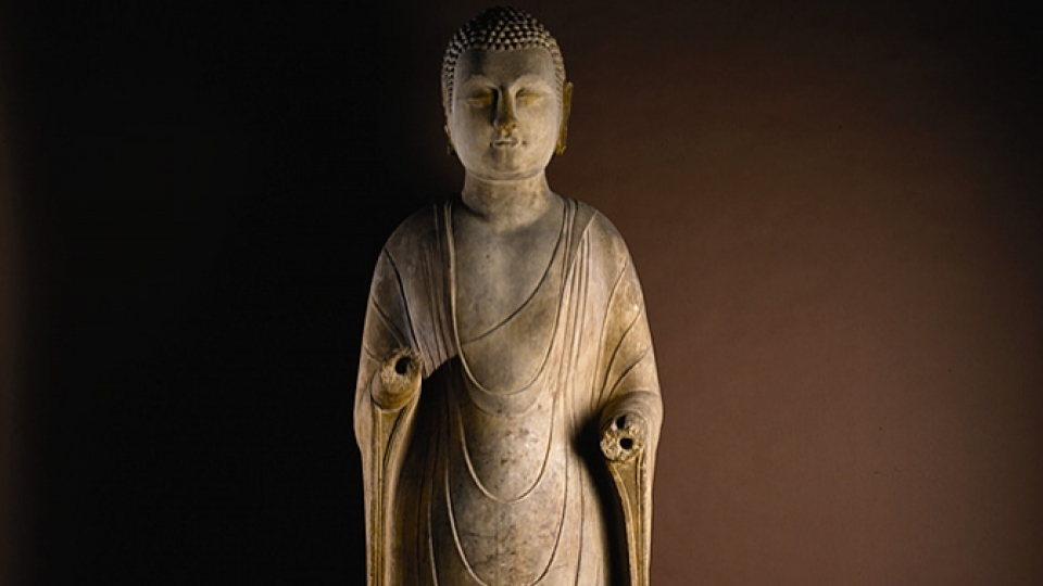 Three-metre tall 6th century marble standing Buddha.