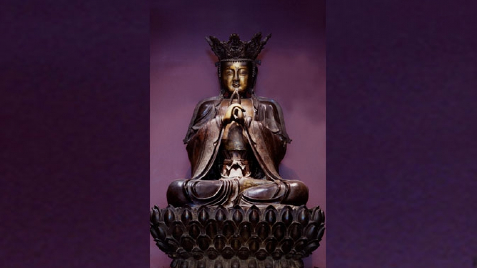 The bronze Vairocana Buddha sits majestically in the Samuel Hall Currelly Gallery.