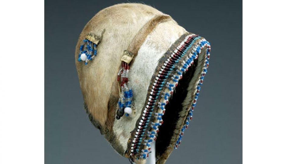 Inuit child's summer bonnet, made of caribou skin decorated with beadwork.