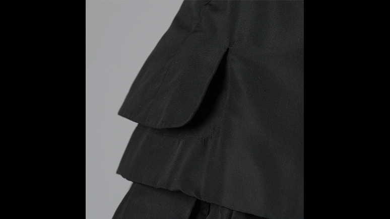 Detail of black dress