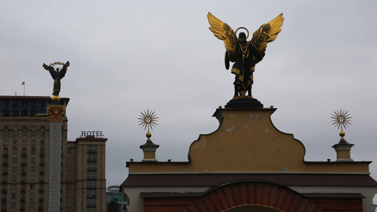 Angel on building in Independence Square, Kyiv.
