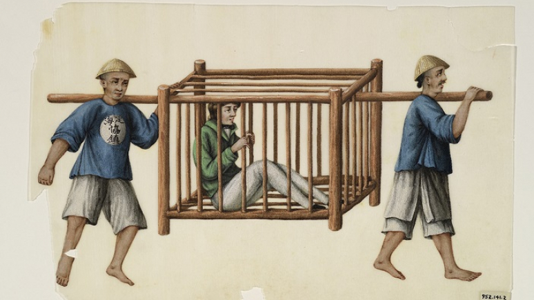 Two men carrying a prisoner in a cage