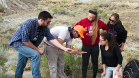Dr. David Evans, James & Louise Temerty Chair, Vertebrate Palaeontology, with students in the field.