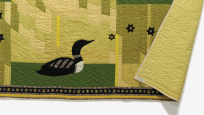 Northern Night (detail), 1955, designed by Ada B. Torrance, sewn by Torrance and members of Simcoe County Arts and Crafts Association, Orillia, Ontario. Cotton tabby textile, pieced, appliqued and embroidered. 956.159.A. Gift of The Star Weekly. Image @ROM.