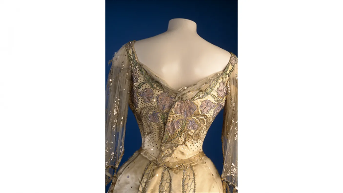 Queen Alexandra's state dress. Morin-Blossier. France. c. 1903. Silk satin with applied design, inserts of chiffon, sequins, diamanté and beads. 942.12.3.A-B Gift of Lieutenant-Colonel James W. Flanagan.