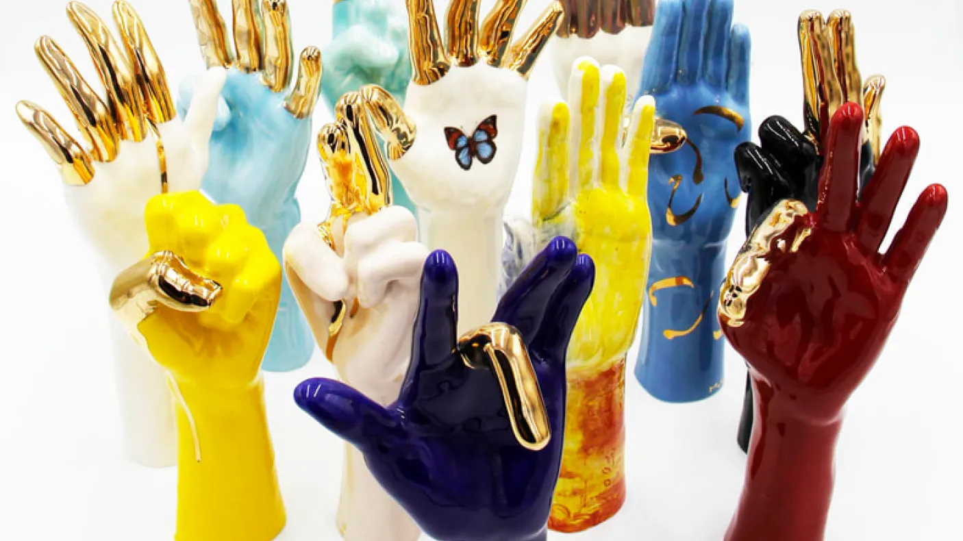 Brightly coloured ceramic hand shapes 