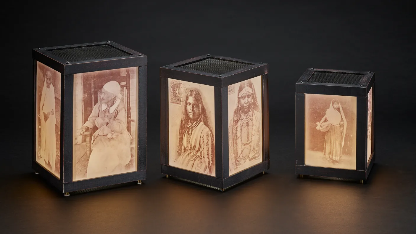 Lanterns illuminating family portraits